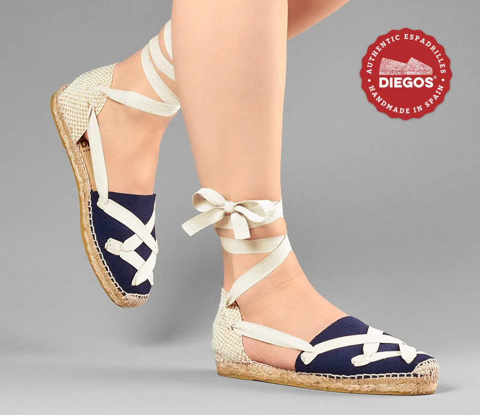 Alpargatas planas Lola clásicas cordones azul marino
