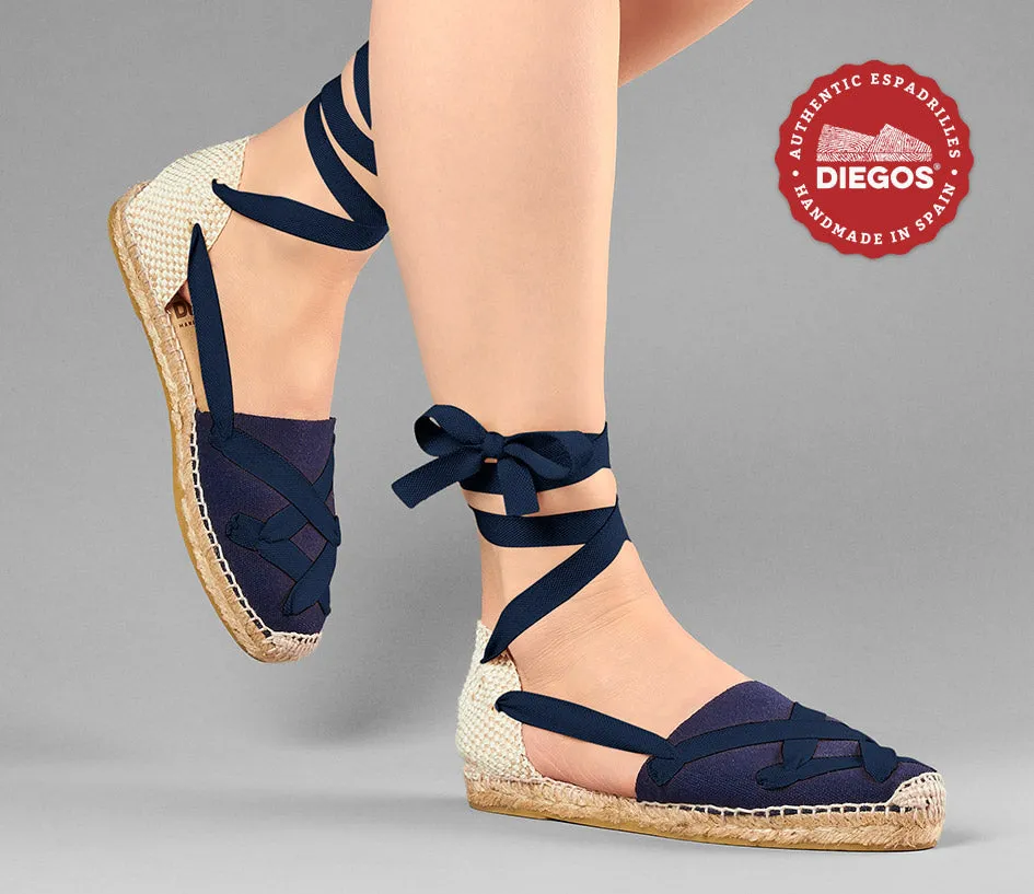 Alpargatas planas Lola clásicas cordones azul marino