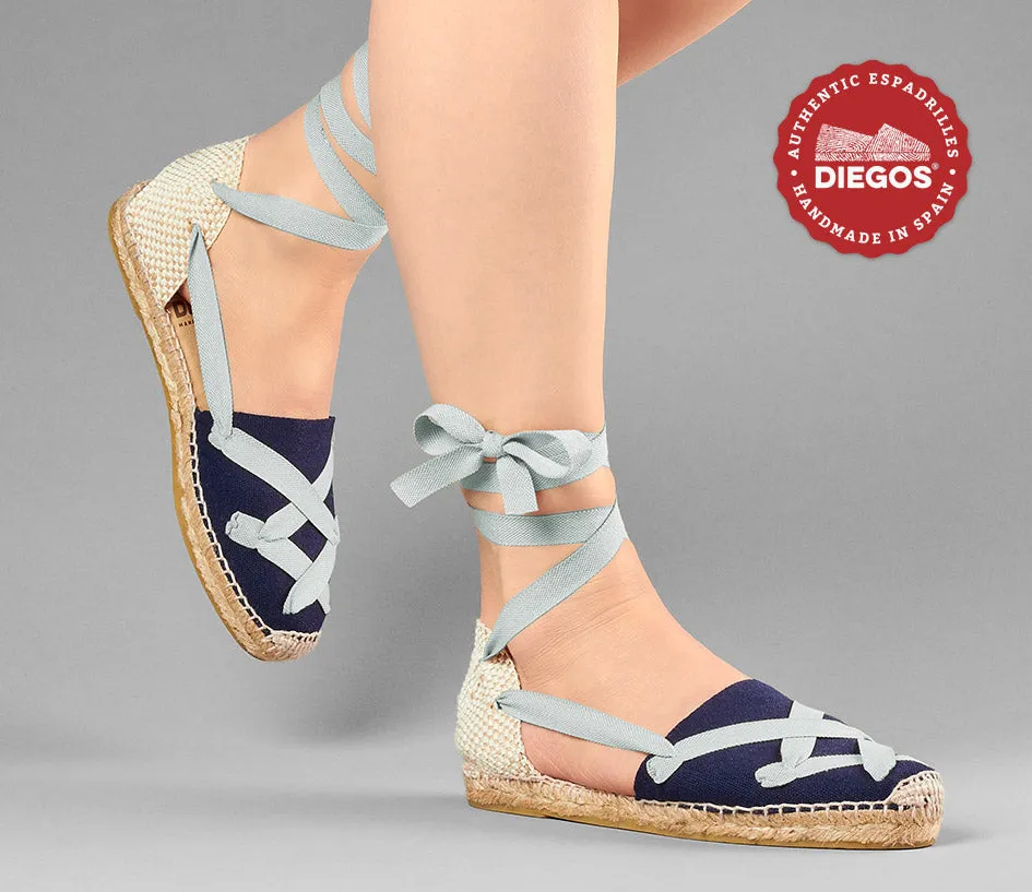 Alpargatas planas Lola clásicas cordones azul marino