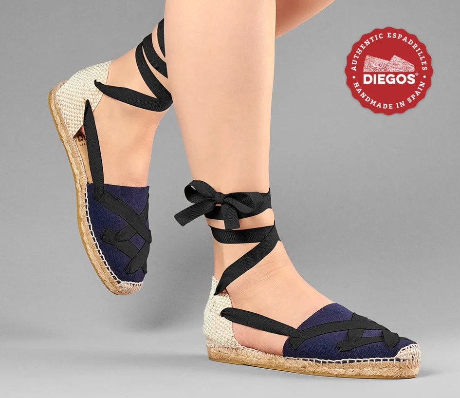 Alpargatas planas Lola clásicas cordones azul marino