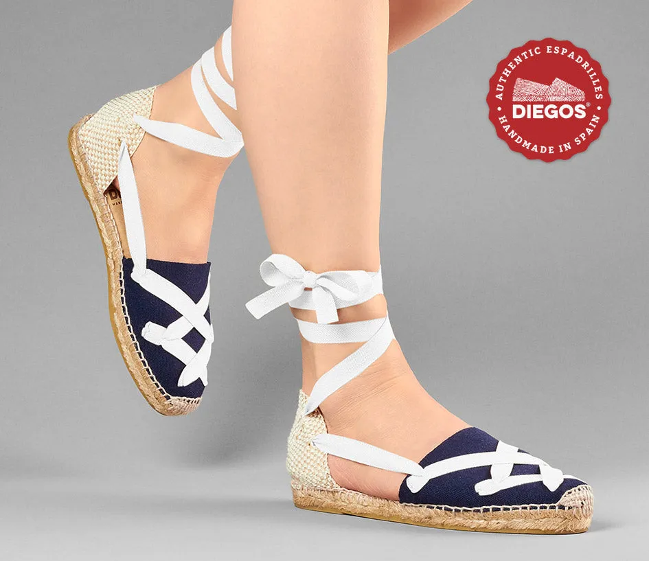 Alpargatas planas Lola clásicas cordones azul marino