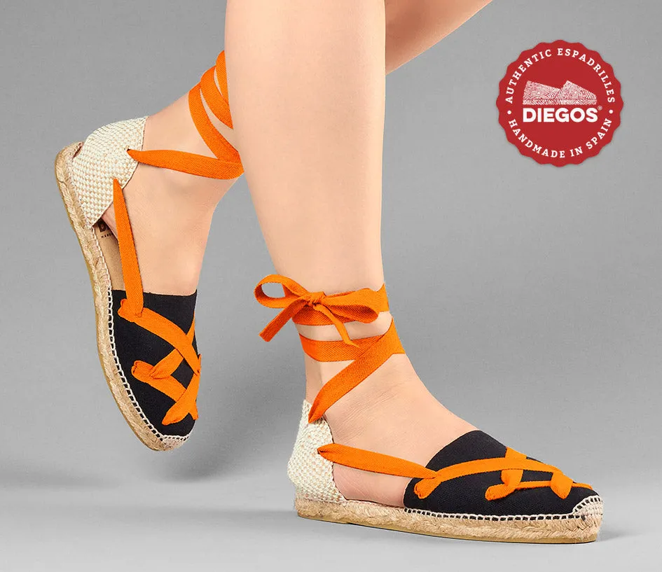 Alpargatas planas Lola clásicas cordones negras