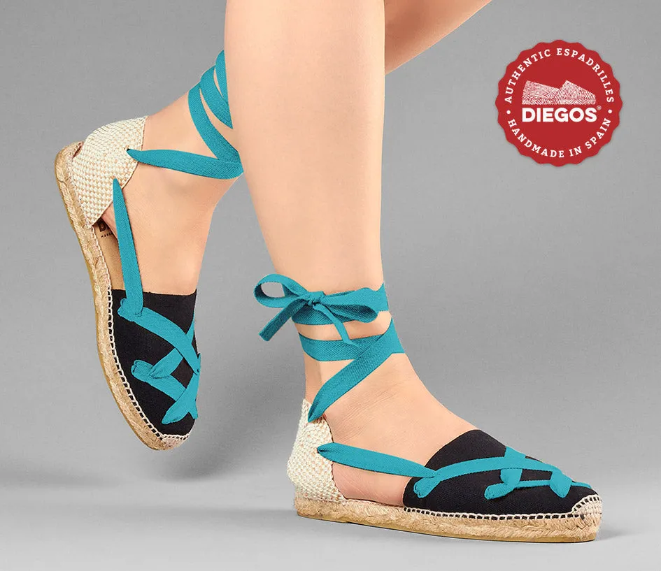 Alpargatas planas Lola clásicas cordones negras